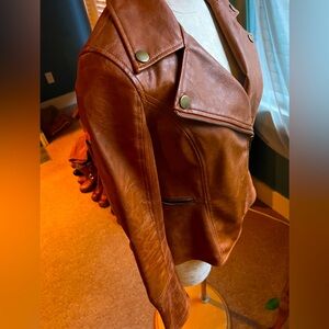 Anthropology brand honey-colored leather jacket.